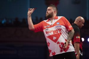 Michael Smith progresses to quarter final - shirt to be auctioned for Autism Support