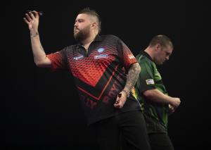 Michael Smith and Dave Chisnall reach Grand Slam last eight