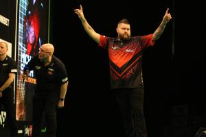 Michael Smith throws a nine-darter in Premier League win