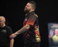 Michael Smith suffers World Grand Prix knockout