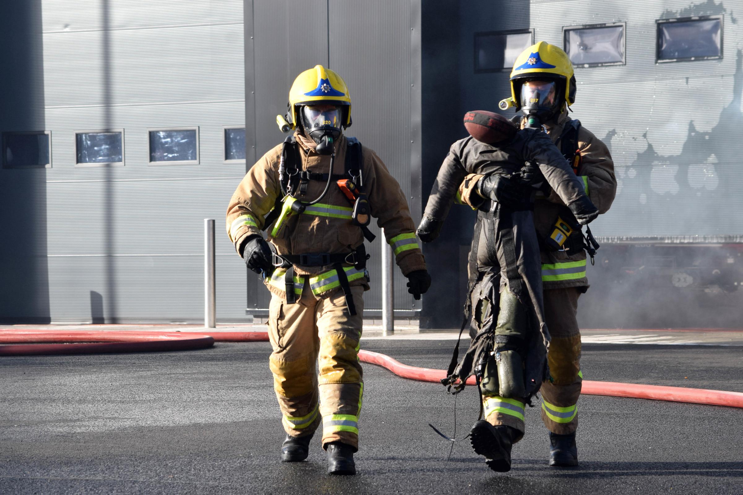 Firefighters carrying out an operational demonstrations for the guests