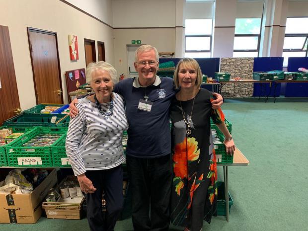 Dennis Roughley with fellow volunteers Trish and Anne