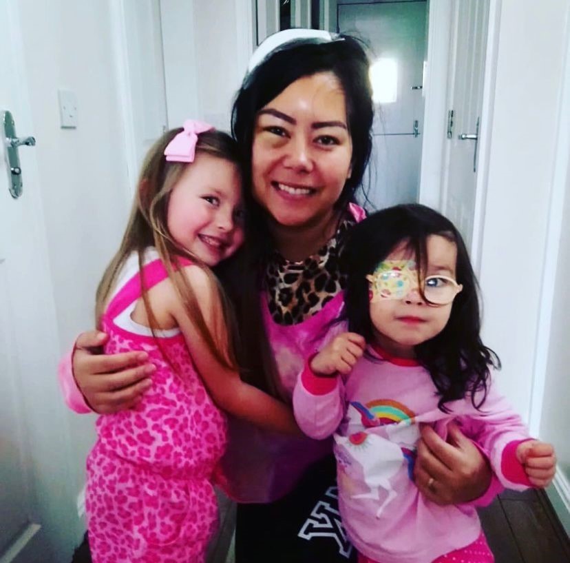 Jennifer with her daughters Emmy and Aria after her operation