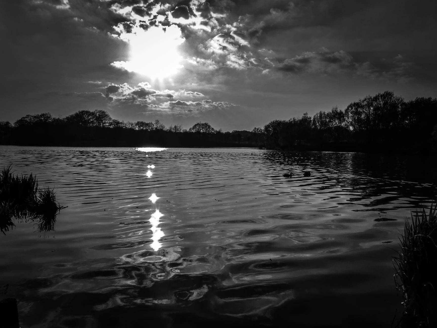 Sunset at Carr Mill Dam by Keith Griffiths