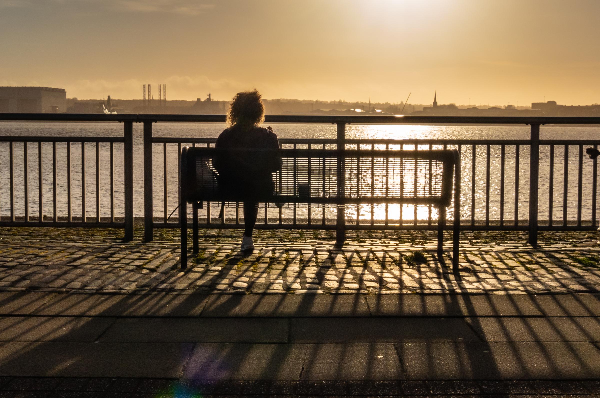 Thinking in the evening sun, Liverpool waterfront