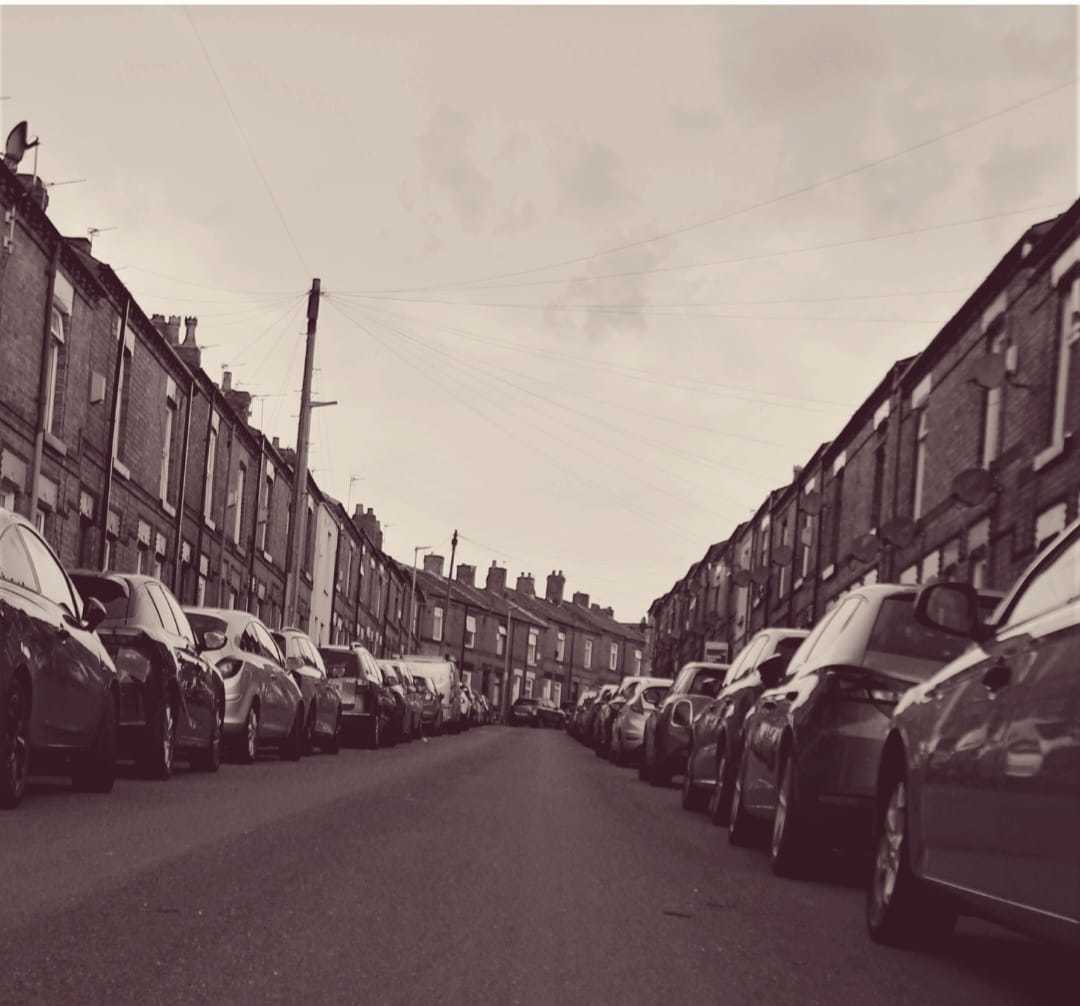 Car lined terraced street, Newtown by Suzie Remadems