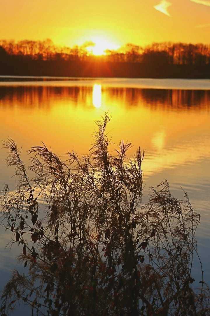 Sunrise over Carr Mill Dam by Peter Boylan