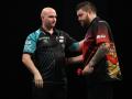 Michael Smith's unbeaten start ended by world champ Rob Cross in Leeds