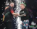 Michael Smith's win keeps him joint top with van Gerwen