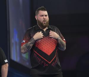 Michael Smith moves into round three of World Darts Championships