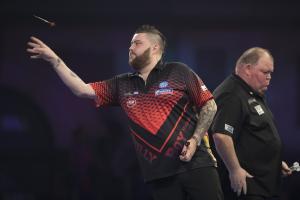 Michael Smith marches on in World Darts Championships