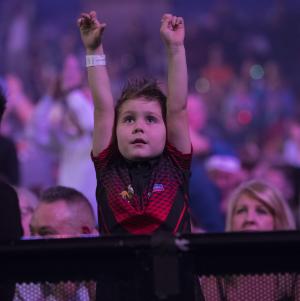 Well done Daddy! Junior cheers Michael Smith to semi victory